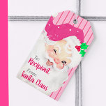 Hot Pink Vintage Winking Santa Christmas Gift Tags<br><div class="desc">This bright magenta pink Vintage Winking Santa Christmas hanging gift tag features an antique Santa Claus graphic that's been recolored and reimagined. The background is a monochromatic tri-tone vertical stripe pattern. . the text for sender and receiver only appears on the front. the back graphic is identical, simply void of...</div>