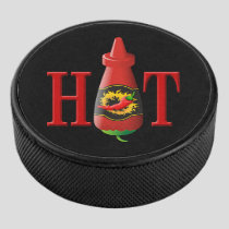 Hot sauce bottle hockey puck
