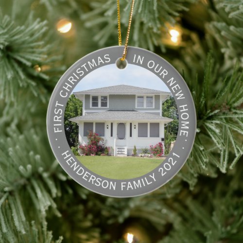 House Photos First Xmas New Home Name & Year Gray Ceramic Ornament - Celebrate the joy of your new place with a custom 2 photo "First Christmas in our New Home" gray and white round ceramic ornament. Wording and pictures on this template are simple to personalize. (IMAGE & TEXT DESIGN TIPS: 1) To adjust position of wording, add spaces at beginning or end. 2) To center the photo exactly how you want, crop it into a square shape before uploading to the Zazzle website.) Design features an elegant grey border, modern minimalist typography family name & year, and 2 images of your choice. This unique family keepsake adds a stylish touch to Xmas home decorations or makes a thoughtful housewarming realtor gift idea. There's no place like a new home for the holidays!