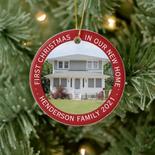 House Photos First Xmas New Home Name & Year Red Ceramic Ornament - Celebrate the joy of your new place with a custom 2 photo "First Christmas in our New Home" red and white round ceramic ornament. Wording and pictures on this template are simple to personalize. (IMAGE & TEXT DESIGN TIPS: 1) To adjust position of wording, add spaces at beginning or end. 2) To center the photo exactly how you want, crop it into a square shape before uploading to the Zazzle website.) Design features an elegant red border, modern minimalist typography family name & year, and 2 images of your choice. This unique family keepsake adds a stylish touch to Xmas home decorations or makes a thoughtful housewarming realtor gift idea. There's no place like a new home for the holidays!