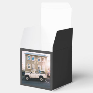 House Themed, A White Jeep Truck Is Parked In Fron Favor Boxes