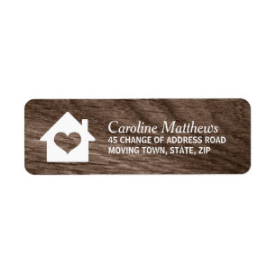 House with heart on elegant wood label