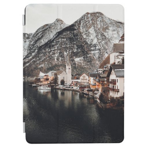 HOUSES NEAR BODY OF WATER AND MOUNTAIN iPad AIR COVER