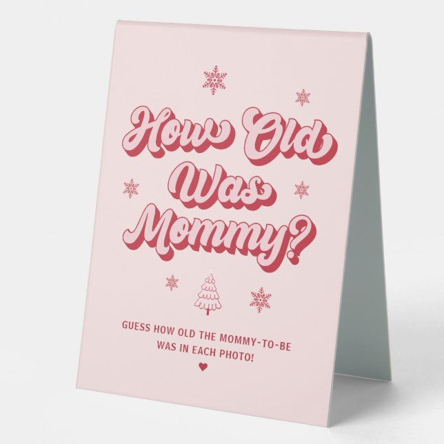 How old was Mommy Christmas Baby Shower Game Table Tent (Front)