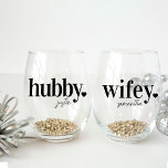 Hubby & Wifey | Personalized Name Newlyweds Stemless Wine Glass<br><div class="desc">Celebrate the couple with this cute text-based honeymoon design featuring "hubby" and "wifey" in black lettering with a small heart illustration. Personalize with each name beneath in handwritten-style script.</div>