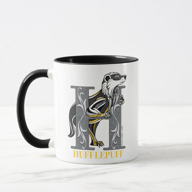 HUFFLEPUFF™ Crosshatched Emblem Mug (Left)