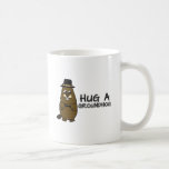 Hug a groundhog coffee mug