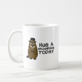 Hug a groundhog today coffee mug (Left)