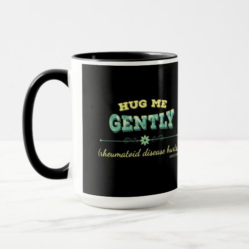 Hug Me Gently Rheumatoid Diseas Hurts mug on black