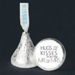 Hugs and Kisses Sticker Hershey's Candy Favors<br><div class="desc">These mouthwatering little drops of goodness have been putting a smile on people’s faces since 1907, over one hundred years of sugary sweetness! Sprinkle Hershey®'s Kisses® on tables to add sparkle to your occasion or arrange Kisses® in unique vases or bowls and use them as centerpieces. However, if you choose...</div>