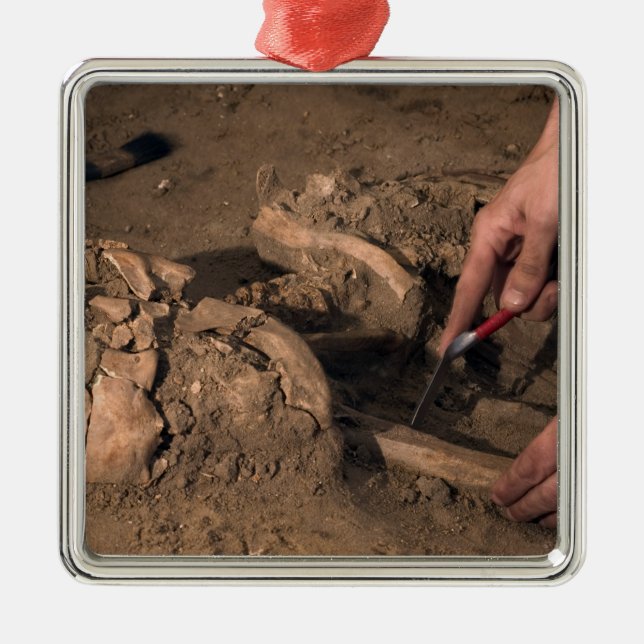 Human remains metal ornament (Front)