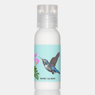 Hummingbird and pink flowers on light blue hand lotion