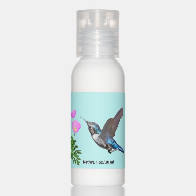 Hummingbird and pink flowers on light blue hand lotion (Front)