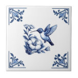 Hummingbird Delft Blue White Floral Corners Bird Ceramic Tile<br><div class="desc">Inspired by vintage antique Dutch Delft tiles from the 1700s, this is a modern take on the historic style. // "blue and white delft", "hummingbird bird ceramic tile", "historic antique ruby throated vintage", "tropical exotic hawaiian birds", "17th 18th century minimal woodland", "flower floral corner flourish", "navy monochrome historic decorative", "monochromatic...</div>