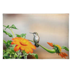 Hummingbird on a flowering plant cloth placemat