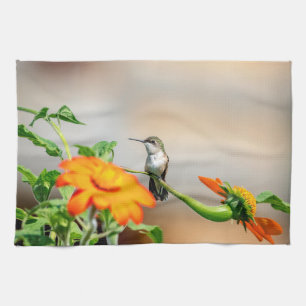 Hummingbird on a flowering plant towel