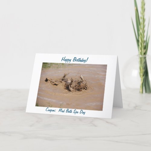 Humorous photo of boxer taking a spa mud bath card