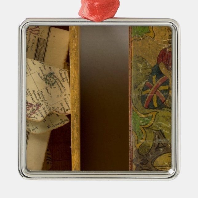 Humphries dissected world map metal ornament (Front)