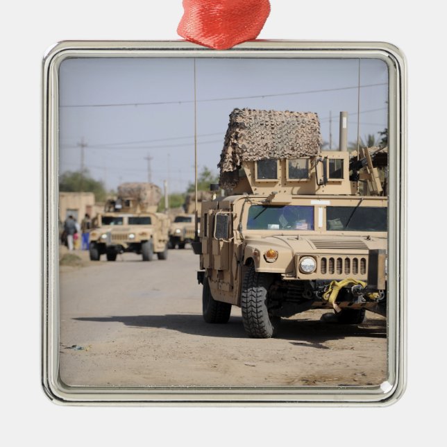 Humvee's conduct security during a patrol metal ornament (Front)