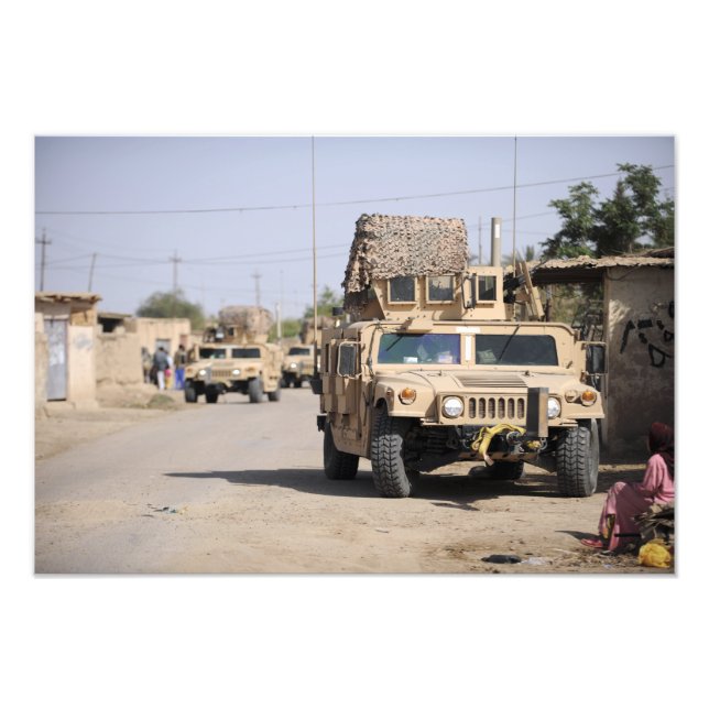 Humvee's conduct security during a patrol photo print (Front)
