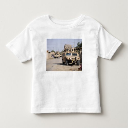 Humvees conduct security during a patrol toddler t_shirt