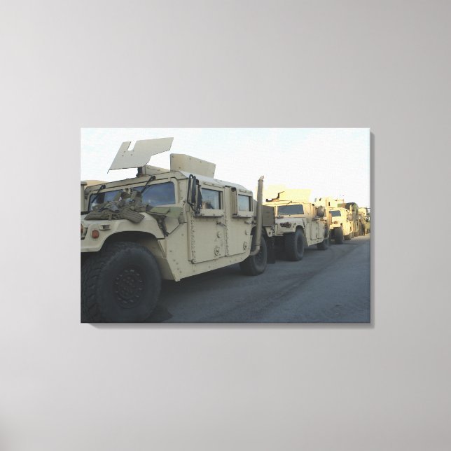 Humvees sit on the pier at Morehead City Canvas Print (Front)