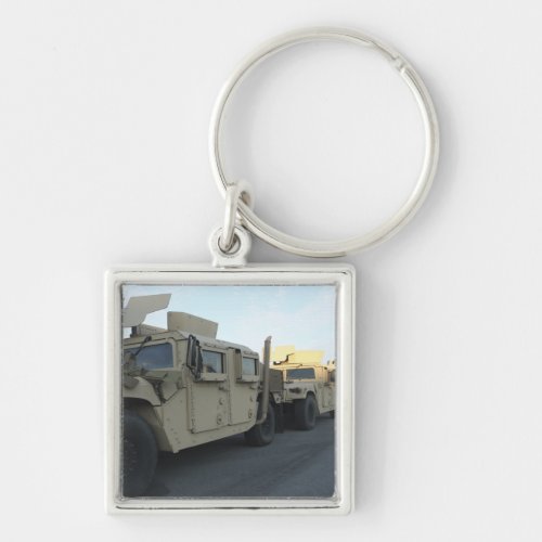 Humvees sit on the pier at Morehead City Keychain