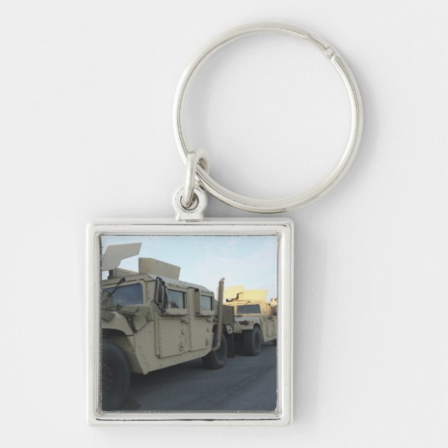 Humvees sit on the pier at Morehead City Keychain (Front)
