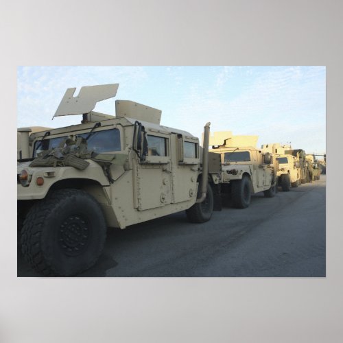 Humvees sit on the pier at Morehead City Poster