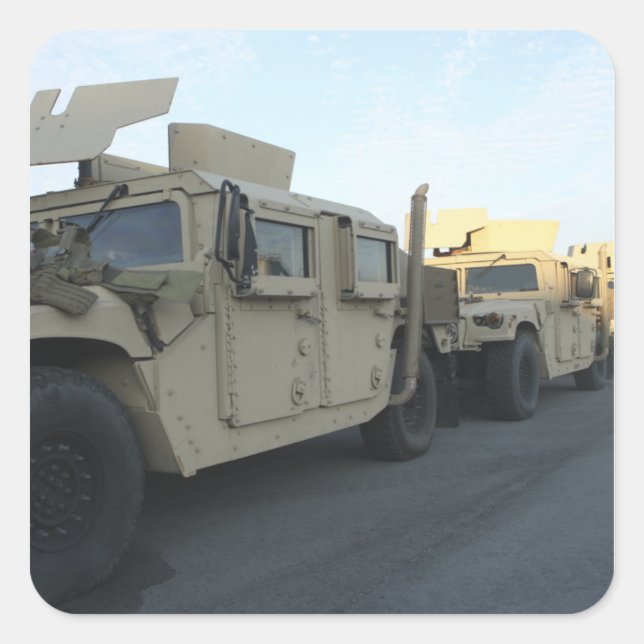 Humvees sit on the pier at Morehead City Square Sticker (Front)