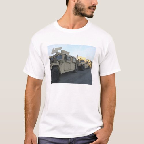 Humvees sit on the pier at Morehead City T_Shirt