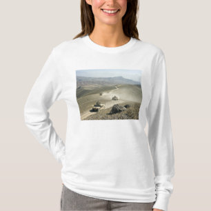 Humvees traverse rugged mountain roads T-Shirt