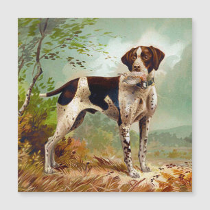 Hunter dog with bird in mouth