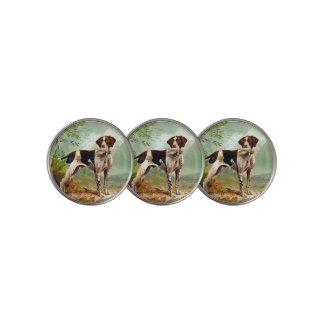 Hunter dog with bird in mouth golf ball marker