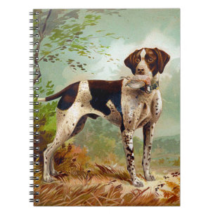 Hunter dog with bird in mouth notebook