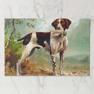 Hunter dog with bird in mouth paper pad