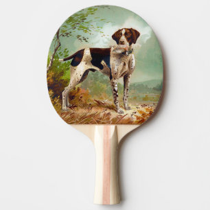 Hunter dog with bird in mouth ping pong paddle