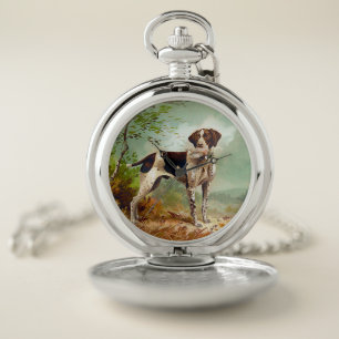Hunter dog with bird in mouth pocket watch