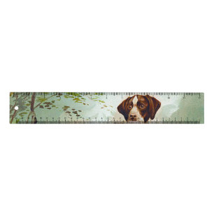 Hunter dog with bird in mouth ruler