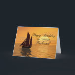 Husband, a sunset yacht birthday card<br><div class="desc">Send birthday greetings with this beautiful card. A yacht sails into a golden sunset over a tranquil ocean. A great card for a yachtsman or sailor.</div>