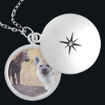 Hyena with young one locket necklace<br><div class="desc">A hyena with a small pup.

© Angelika Stern</div>