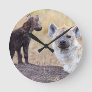 Hyena with young one round clock