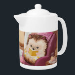 Hygge Hedgehog Teapot<br><div class="desc">A cozy hedgehog reclines in a comfy chair with a book in this acrylic illustration by Lydia Holloway.</div>