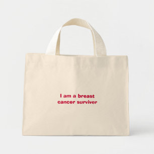 I am a breast cancer surviver mini tote bag