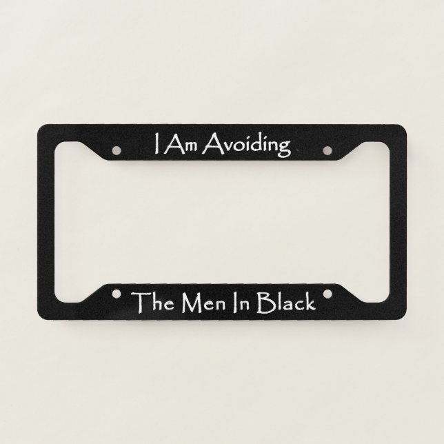 I Am Avoiding The Men In Black  License Plate Frame (Front)