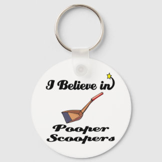 i believe in pooper scoopers keychain