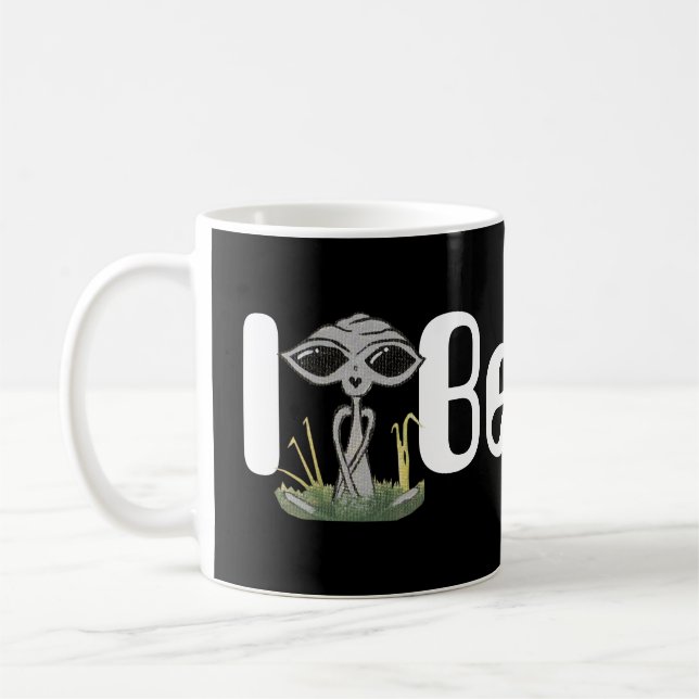 I Believe Sitting Alien Coffee Mug (Left)