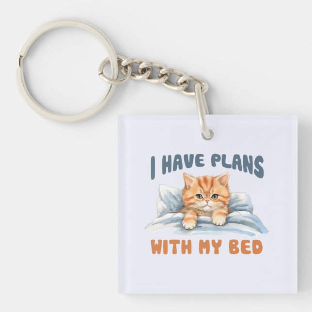 I Have Plans with My Bed – Cozy Orange Cat Keychain (Front)