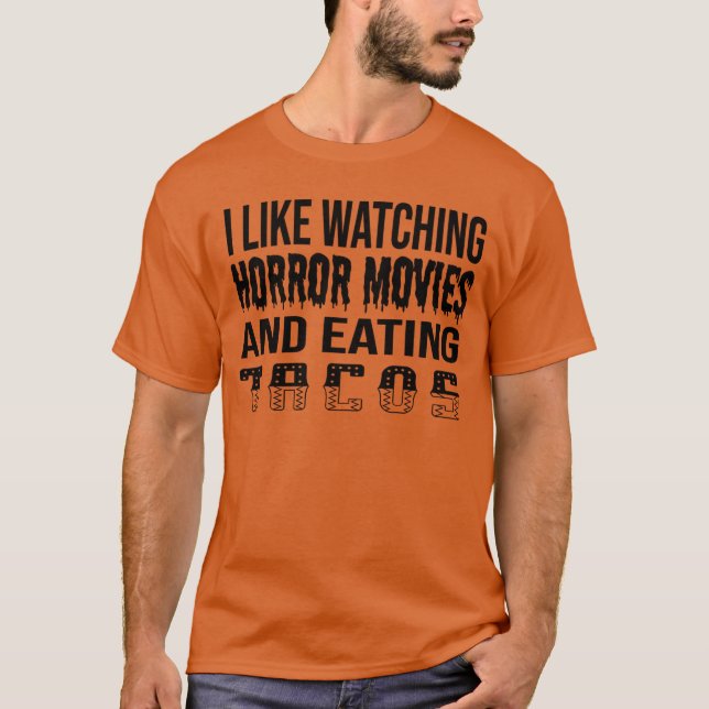 I Like Watching Horror Movies And Eatingacos funny T-Shirt (Front)