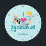 I Love Gymnastics Cute Personalized Teal Gymnast Round Clock<br><div class="desc">I Love Gymnastics. A pretty gymnastics girls room clocks with adorable teal text in between two tumbling girls and a beautiful pink heart. Cute gymnast decor for a kids gym or women's gymnastic coach.</div>